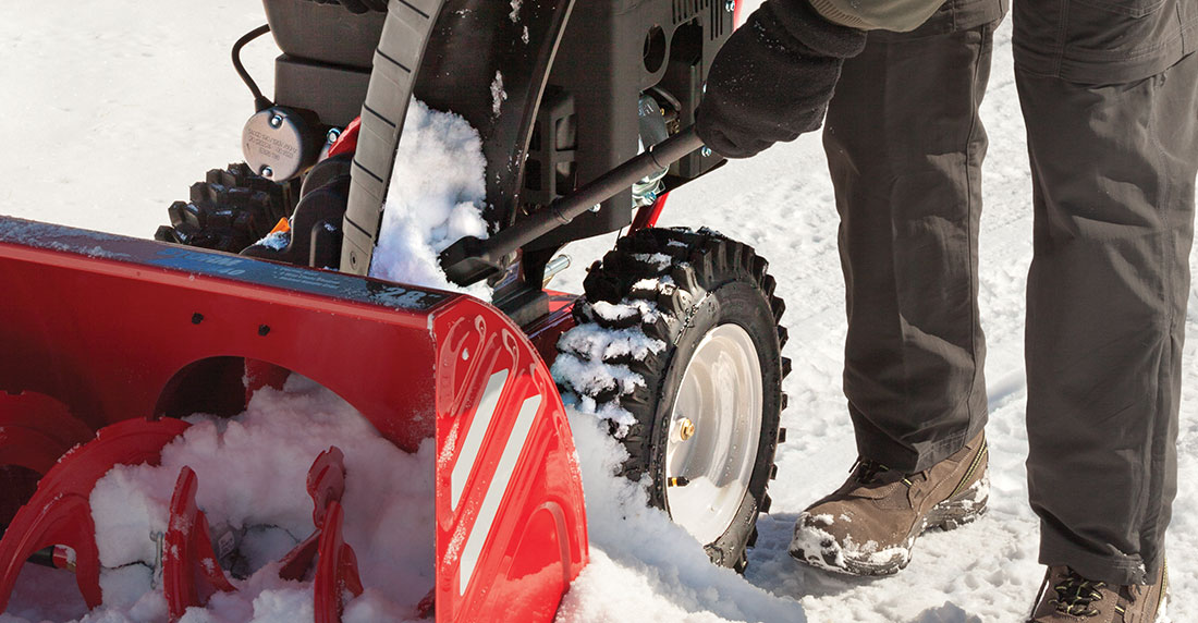 Troy-Bilt snow blower clean out tool and clogged chute