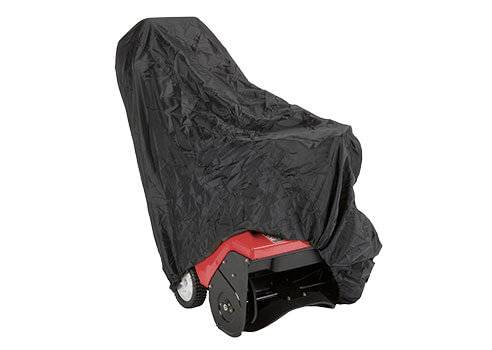 snow blower cover draped over single-stage snow blower