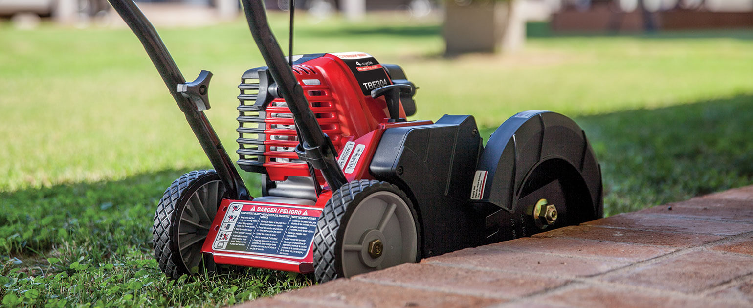 battery powered lawn edger with blade